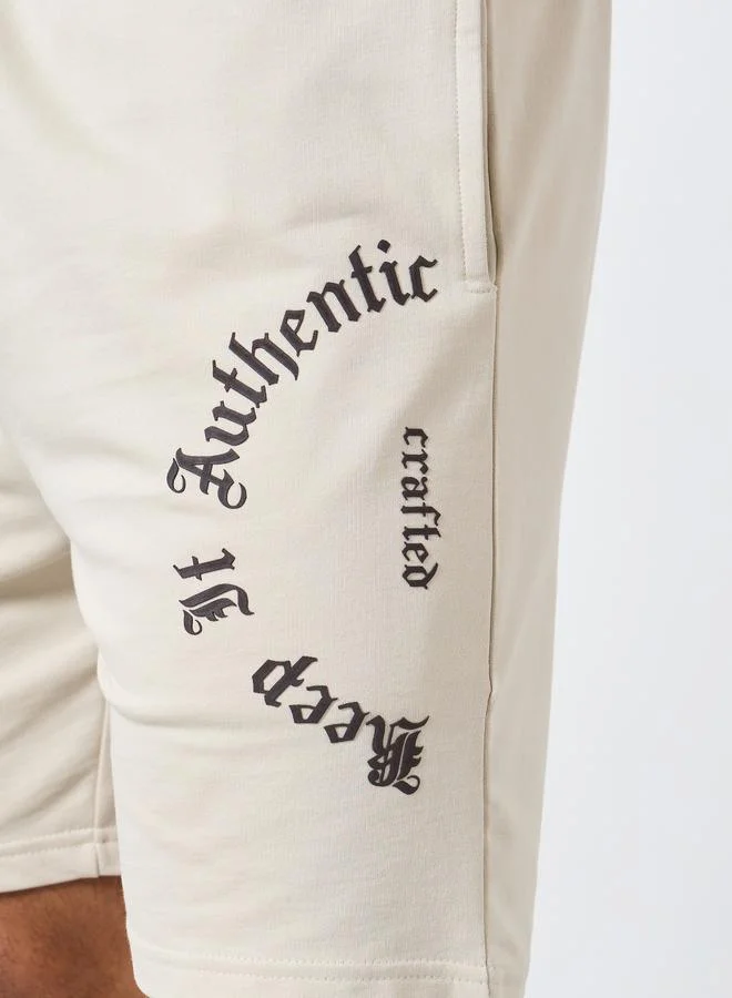 Styli Men Beige Slogan Print Regular Fit Shorts